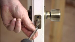 repairing a broken door lock